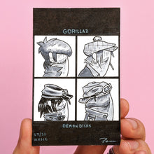 This drawing by Brendan Pearce is a tribute to the artwork for the cover of the Gorillaz album Demon Days. It shows the portraits of the band members as penises and has the title Demon Dicks. It is called "Music" and is for day 27 of Knobtober 2020.