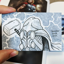A drawing of Thor the god of thunder holding his hammer but Thor is a penis